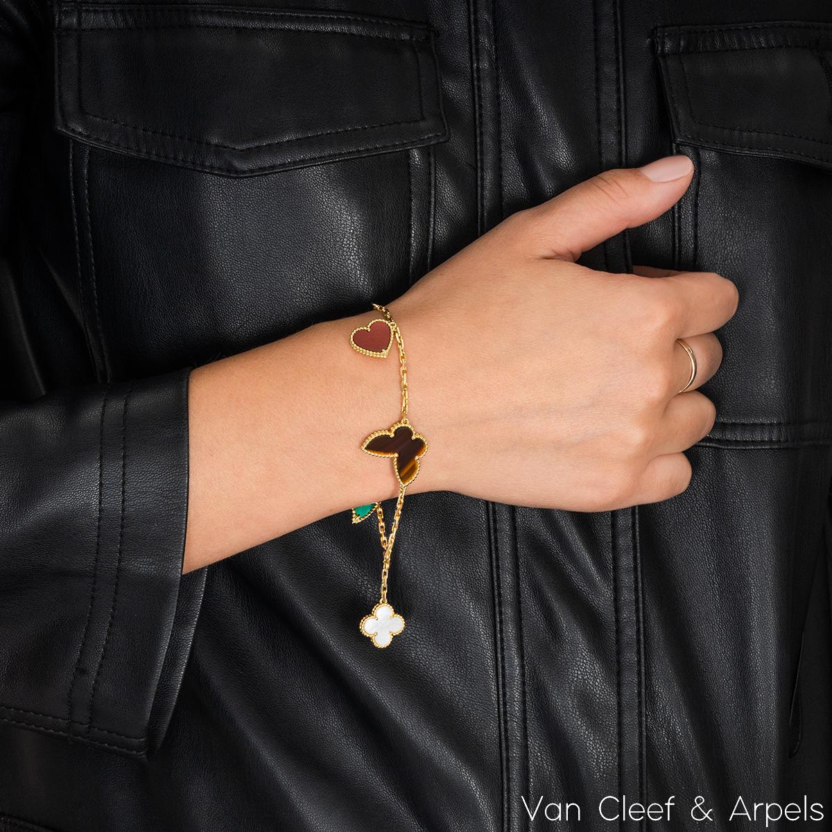 Van Cleef & Arpels Yellow Gold Lucky Alhambra 4 Motif Bracelet VCARD79600 In Excellent Condition In London, GB