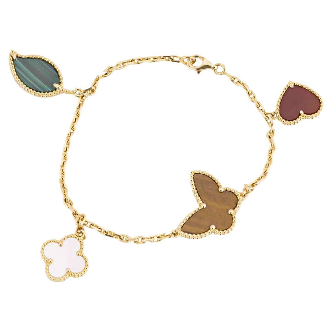 Van Cleef
Arpels Yellow Gold Lucky Alhambra 4 Motif Bracelet VCARD79600