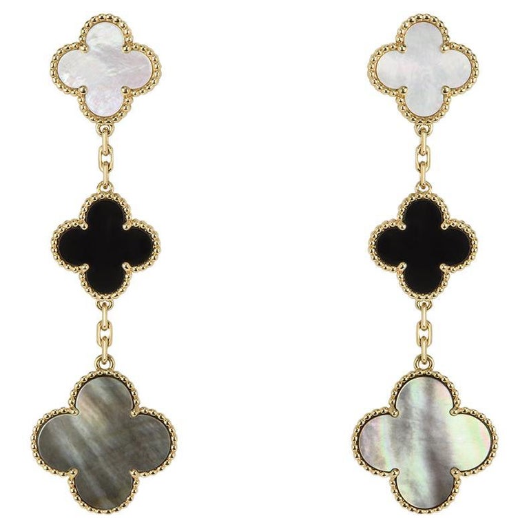Van Cleef and Arpels Magic Alhambra 4 Motifs Mother of Pearl Earrings at  1stDibs  van cleef 4 motif earrings, van cleef dangle earrings, van cleef  and arpels dangling earrings