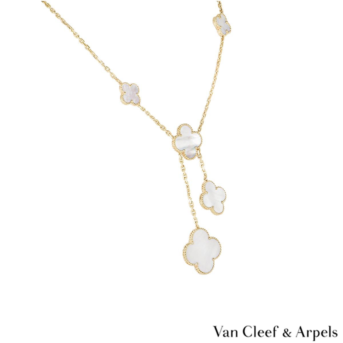A luxurious 18k yellow gold mother of pearl necklace by Van Cleef & Arpels from the Magic Alhambra collection. The necklace features 6 four leaf clover motifs set to the centre with mother of pearl and complemented by a beaded outer edge. The