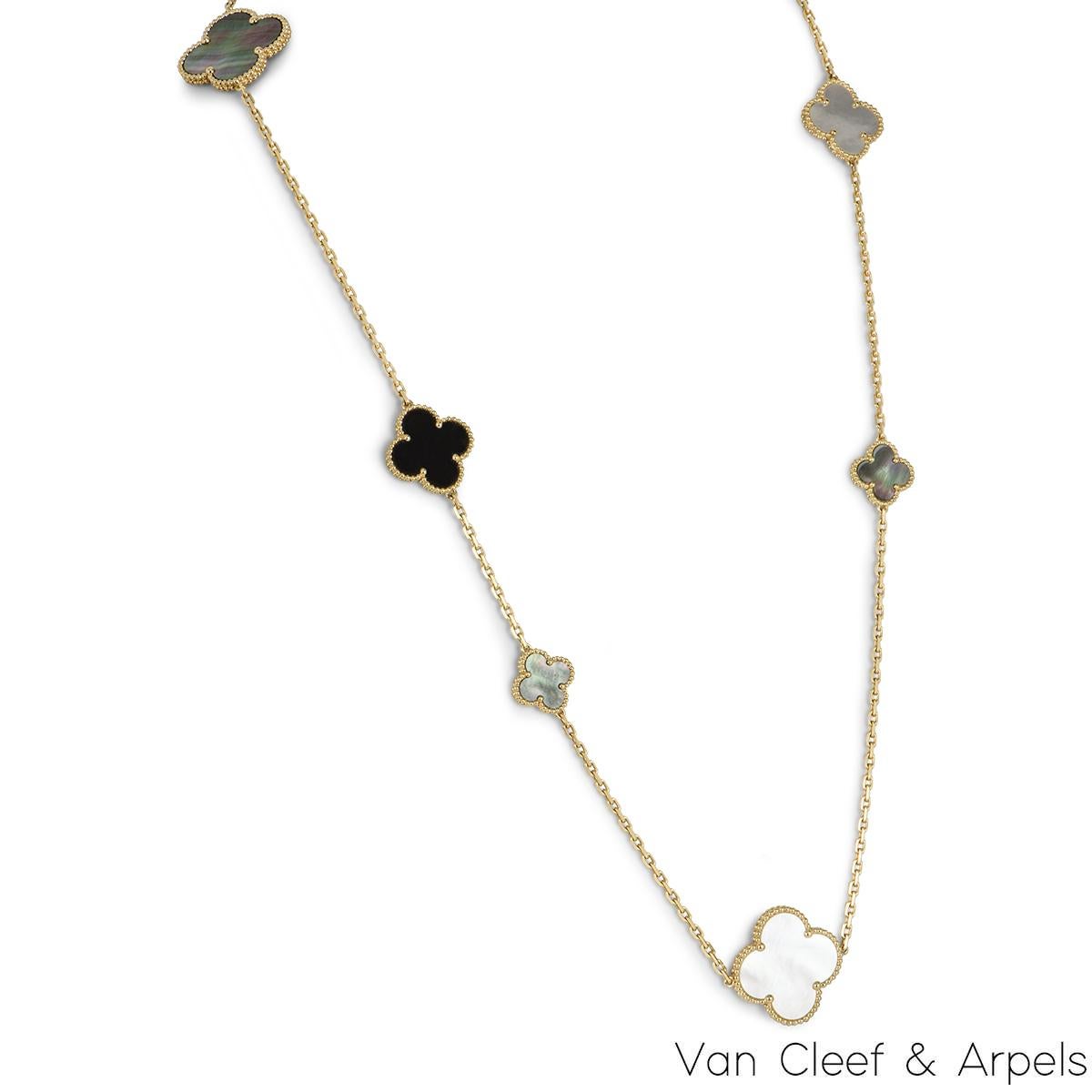 An iconic 18k yellow gold Van Cleef & Arpels necklace from the Magic Alhambra collection. The necklace comprises of 16 iconic 4 leaf clover motifs alternating in size, set with onyx, grey and white mother of pearl inlays complemented by a beaded