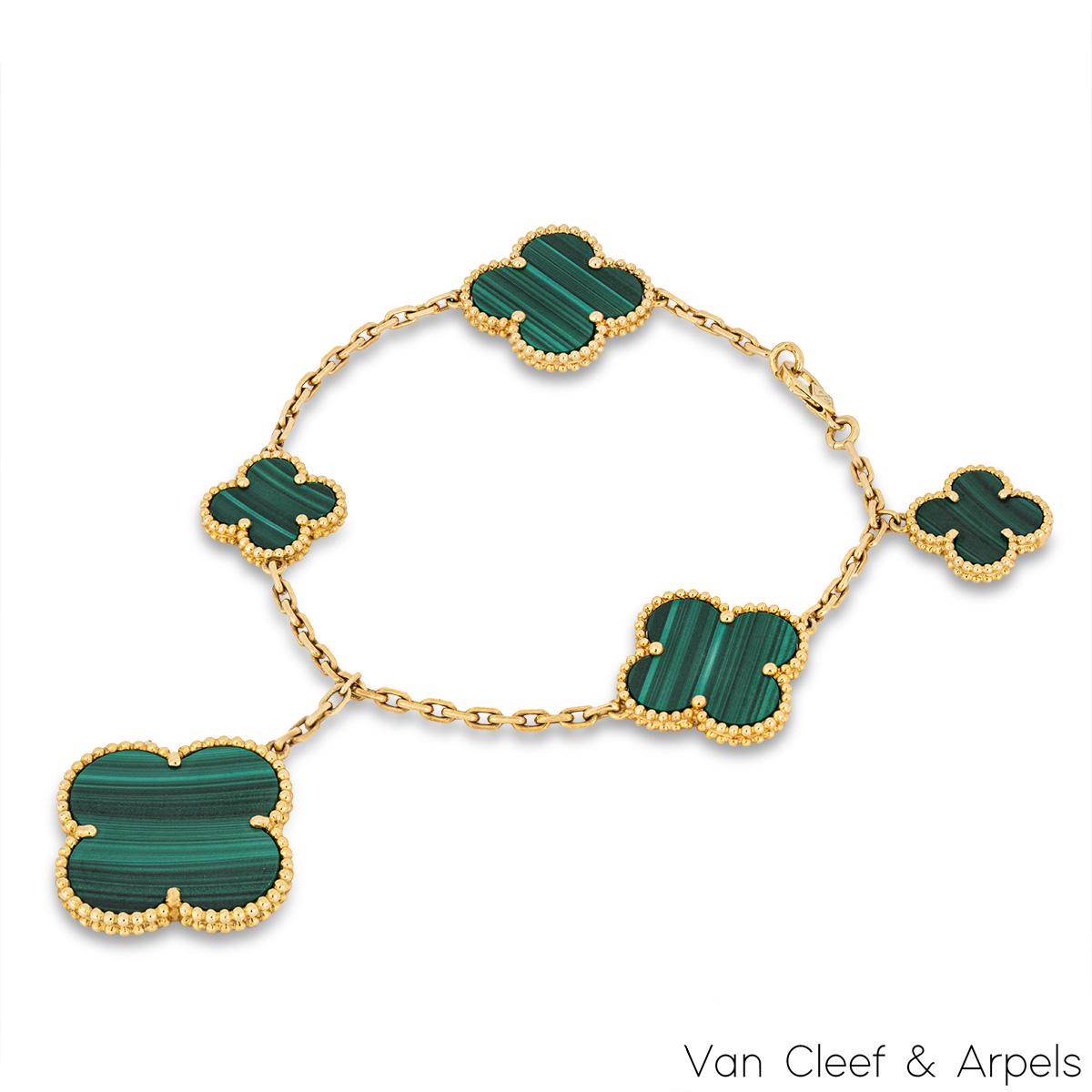 A luxurious 18k yellow gold malachite bracelet by Van Cleef & Arpels from the Magic Alhambra collection. The bracelet features 5 four leaf clover motifs that vary in size, set to the centre with a malachite inlay and complemented with a beaded outer