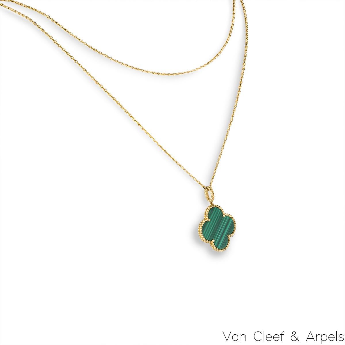 A gorgeous 18k yellow gold malachite long necklace by Van Cleef & Arpels from their Magic Alhambra collection. The necklace comprises of the iconic 4-leaf clover motif pendant set with a malachite inlay, complemented by a beaded edge. Measuring