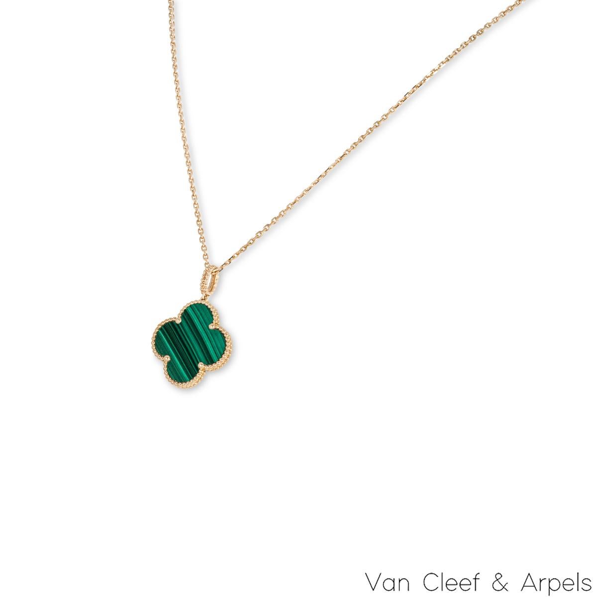 A gorgeous 18k yellow gold malachite necklace by Van Cleef & Arpels from the Magic Alhambra collection. The necklace comprises of the iconic 4-leaf clover motif pendant set with a malachite inlay and complemented with a beaded edge. The pendant