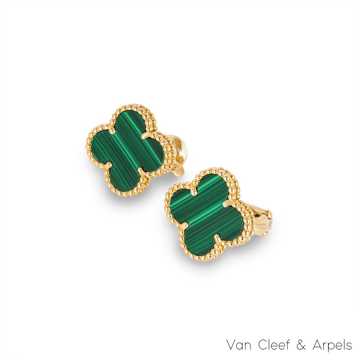 An elegant pair of 18k yellow gold malachite Van Cleef & Arpels earrings from the Vintage Alhambra collection. The earrings feature the iconic 4-leaf clover motif, with a malachite inlay set to the centre, complemented by a beaded edge. The 1.5cm