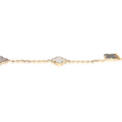 Van Cleef & Arpels Yellow Gold Mother Of Pearl and Onyx Magic Alhambra 16 Motif