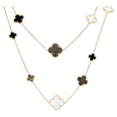 Van Cleef & Arpels or jaune nacre et onyx Magic Alhambra 16 Motif Ne