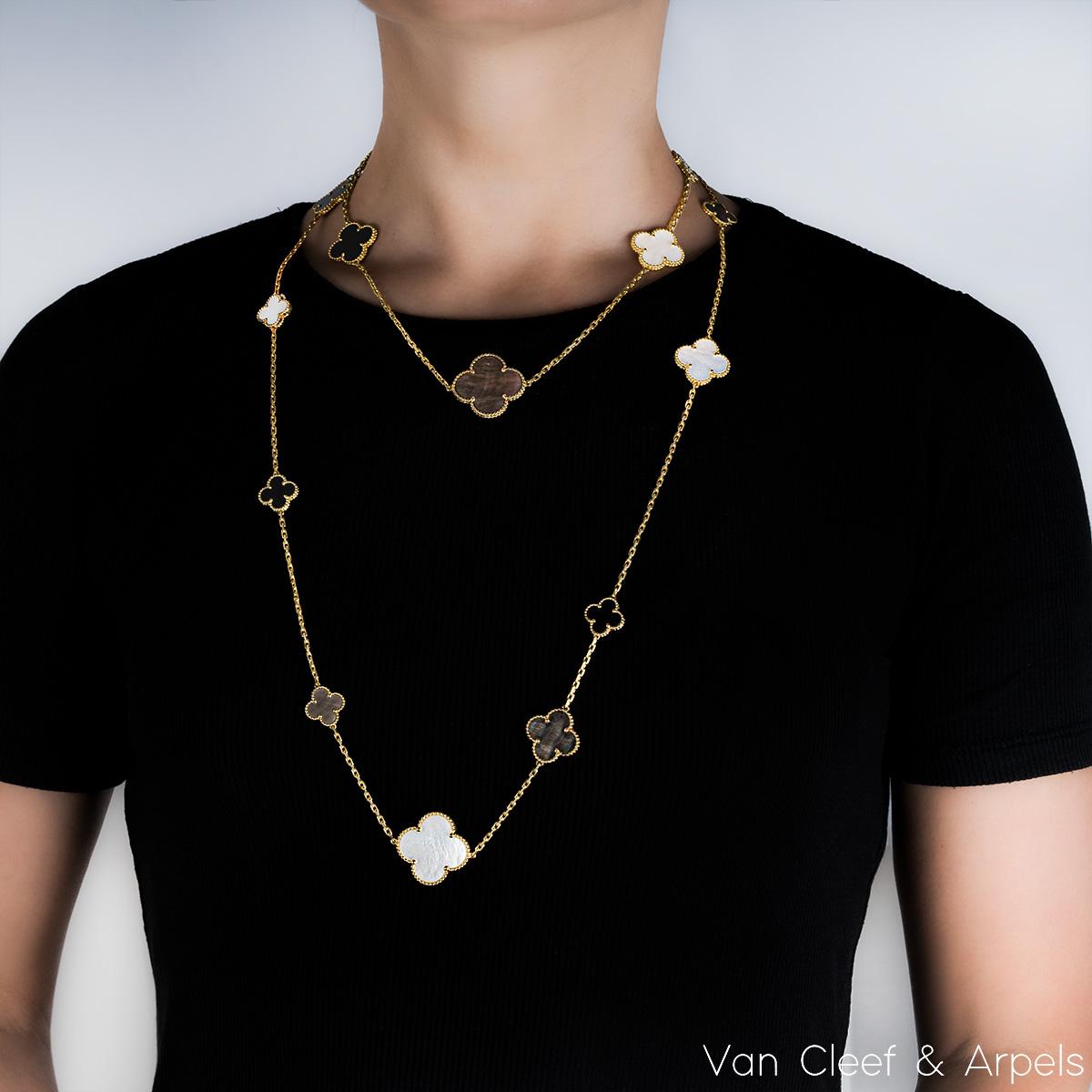 Van Cleef & Arpels Yellow Gold Mother of Pearl & Onyx Magic Alhambra Necklace In Excellent Condition In London, GB