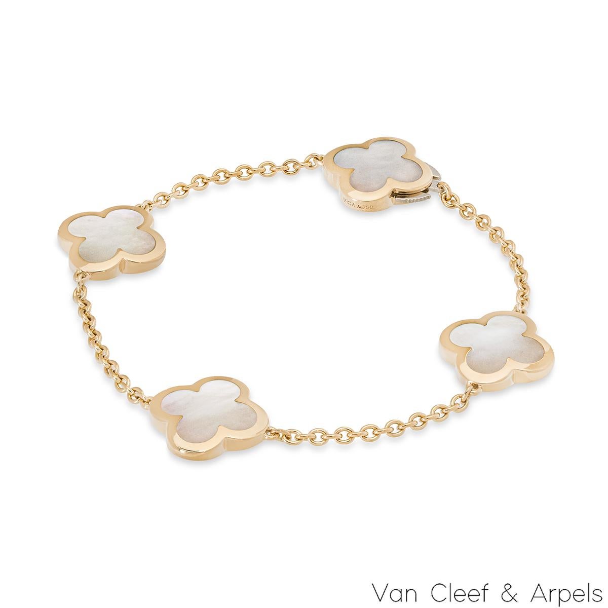 An 18k yellow gold Pure Alhambra bracelet by Van Cleef & Arpels. The bracelet is composed of 4 iconic four leaf clover motifs, set to the centre with mother of pearl inlays and a polished outer edge. The bracelet measures 7 inches in length and has