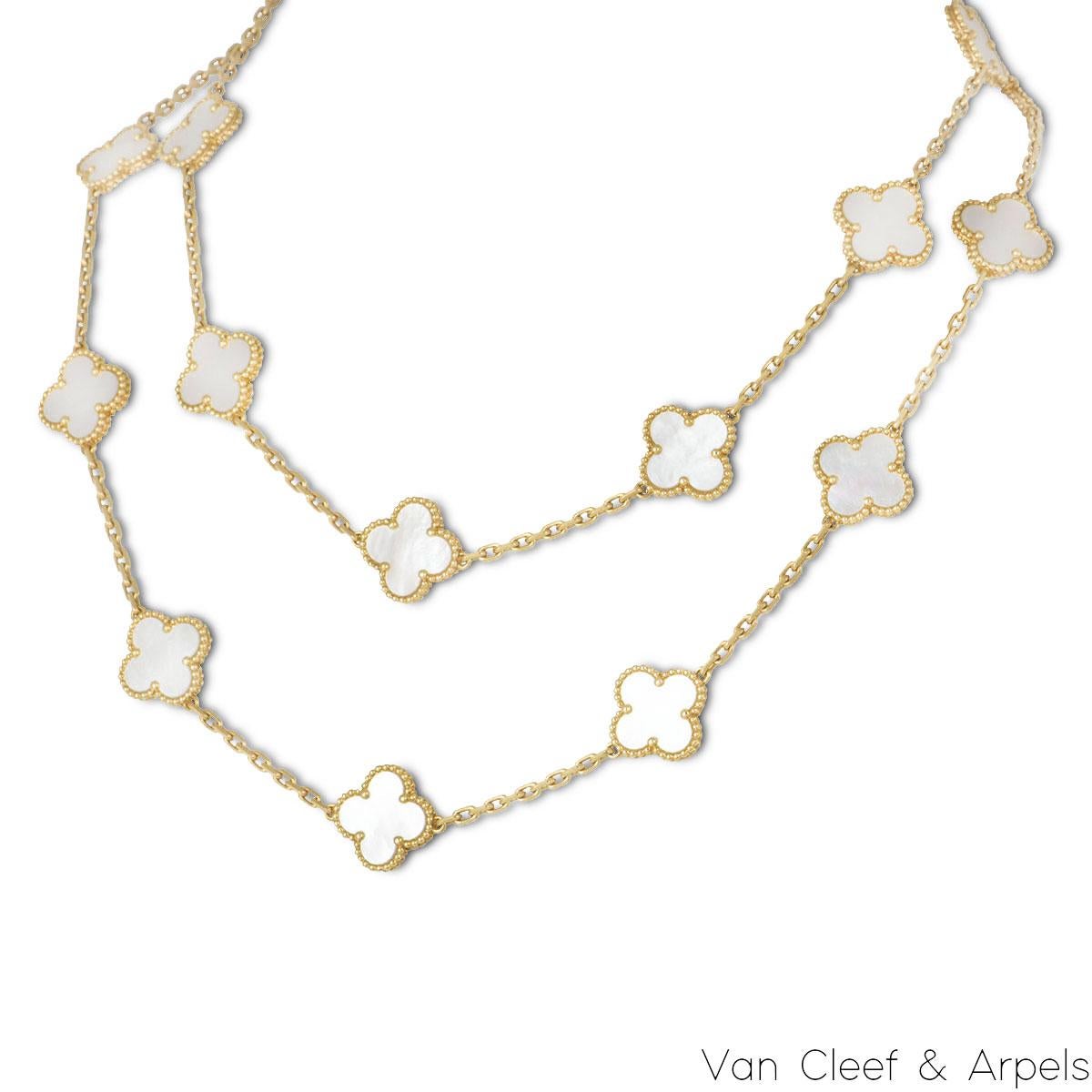 An 18k yellow gold mother of pearl necklace from the Vintage Alhambra collection by Van Cleef & Arpels. The necklace features 20 iconic 4-leaf clover motifs, each set with a beaded edge and a mother of pearl inlay, set throughout the length of the