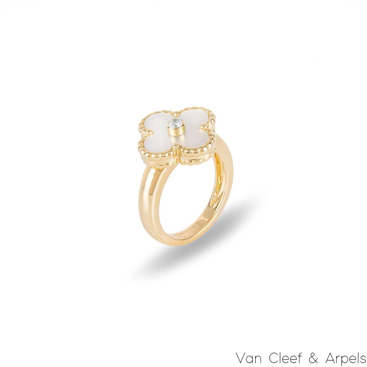 A beautiful 18k yellow gold mother of pearl Van Cleef & Arpels ring from the Vintage Alhambra collection. The ring features the iconic 4-leaf clover motif with a mother of pearl inlay, complemented by a beaded edge and a round brilliant cut diamond