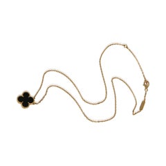 Van Cleef & Arpels Yellow Gold Onyx 1990s Vintage Alhambra Pendant