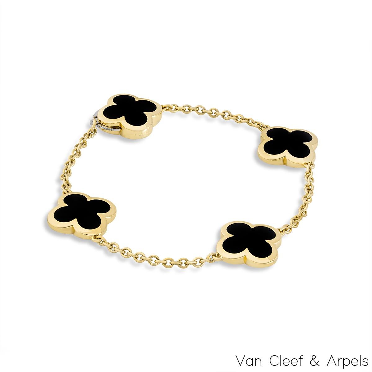 An 18k yellow gold Pure Alhambra bracelet by Van Cleef & Arpels. The bracelet is composed of 4 iconic four leaf clover motifs, set to the centre with onyx inlays and a polished outer edge. The bracelet measures 7 inches in length and has a gross