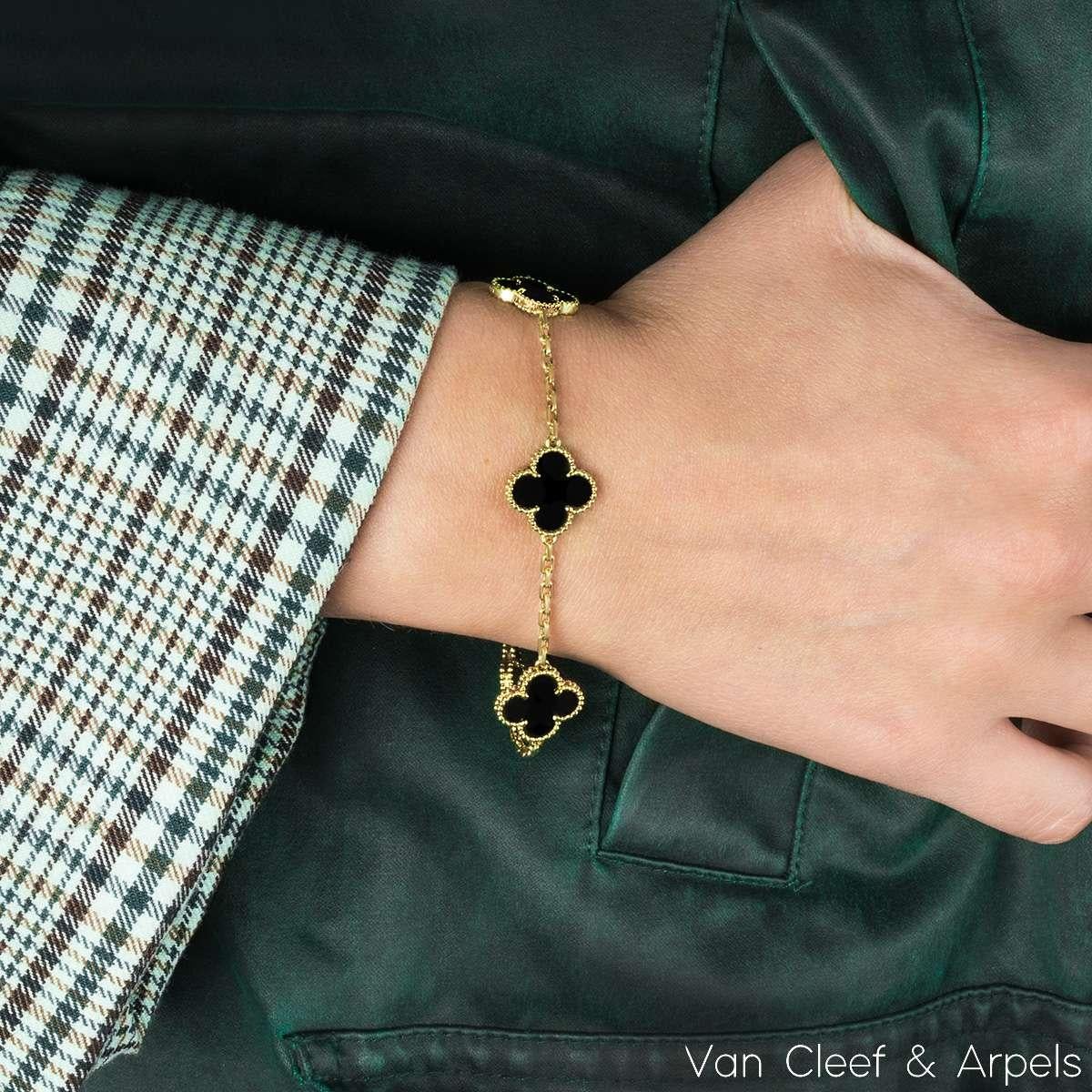 Van Cleef & Arpels Gelbgold Onyx Vintage Alhambra Armband mit 5 Motiven VCARA41300, Vintage 1