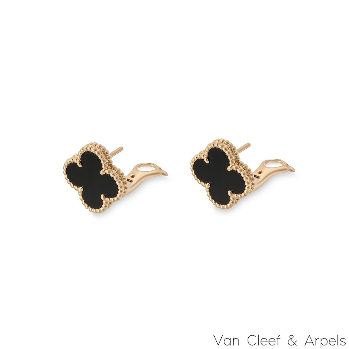 An elegant pair of 18k yellow gold onyx Van Cleef & Arpels earrings from the Vintage Alhambra collection. The earrings feature the iconic 4-leaf clover motif, with an onyx inlay set to the centre, complemented by a beaded edge. The 1.5cm wide