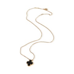 Ciondolo Van Cleef & Arpels in oro giallo con onice vintage Alhambra