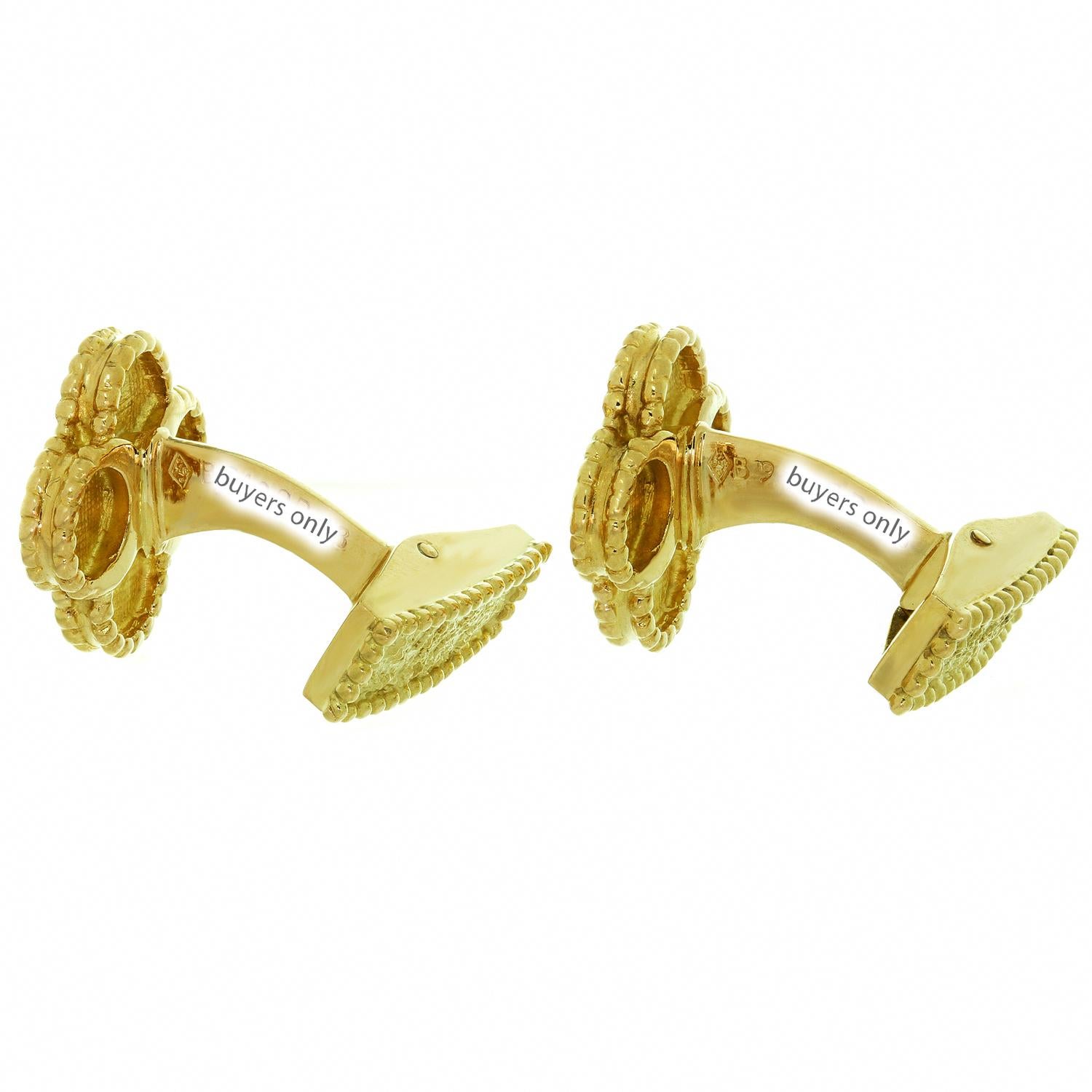 These iconic cufflinks from Van Cleef & Arpels's Vintage Alhambra collection are made in 18k textured yellow gold and feature the classic festive design inspired by the symbol of luck. Made in France circa 1990s. Measurements: 0.59