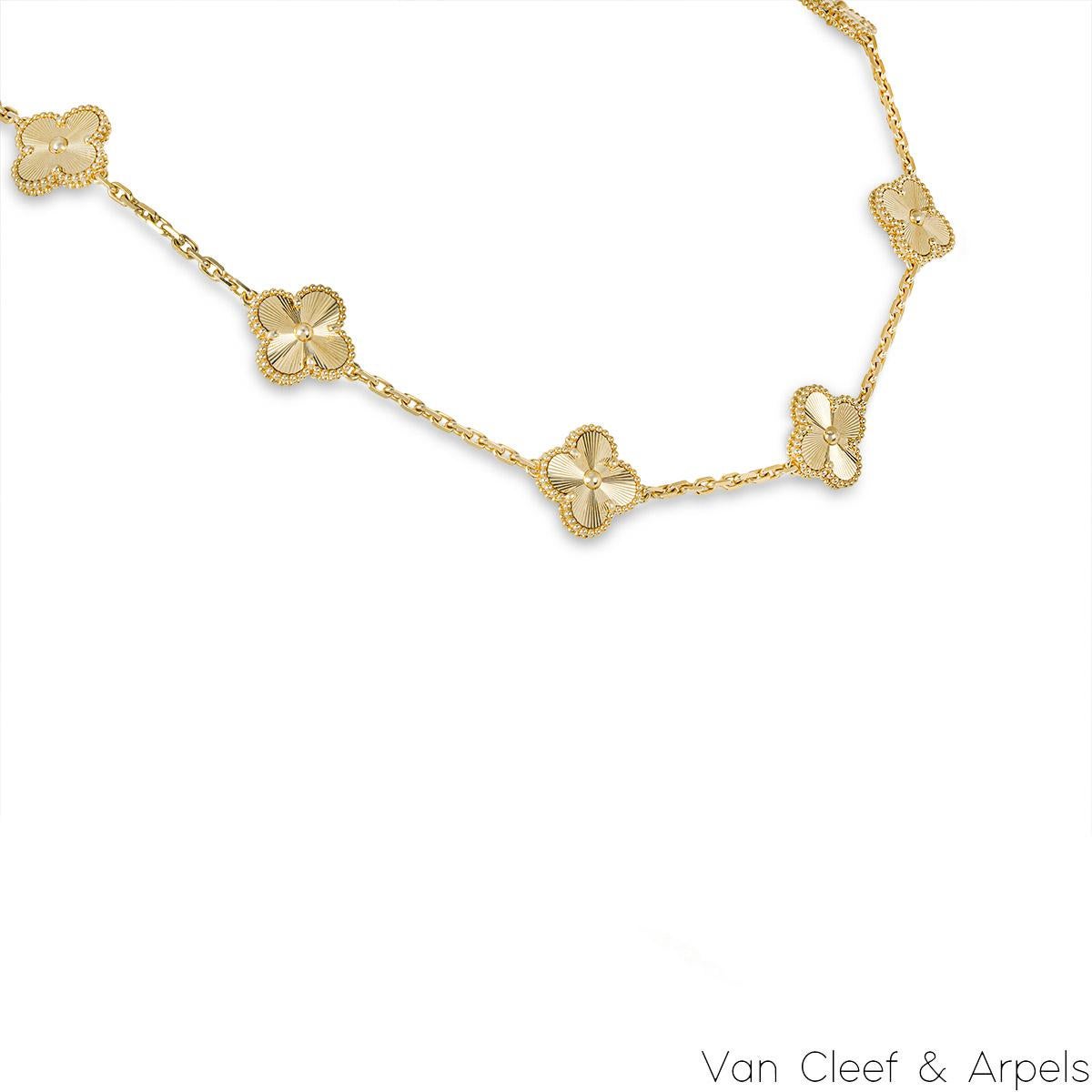 An elegant 18k yellow gold necklace by Van Cleef & Arpels from the Vintage Alhambra collection.  The necklace has 10 motifs, each set with a guilloche pattern and complemented by a beaded outer edge. The necklace measures 16.5 inches in length,
