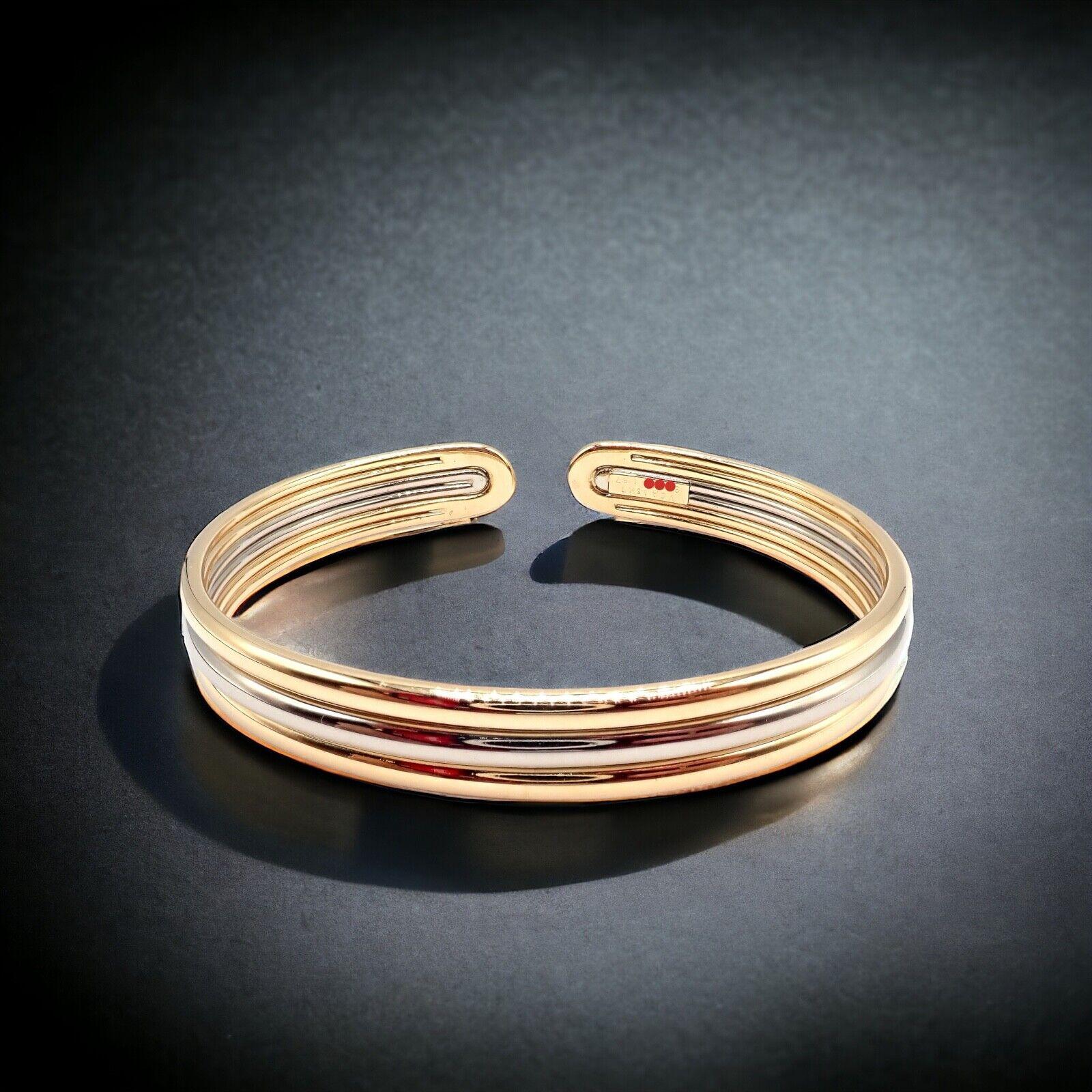 Van Cleef & Arpels Yellow & White Gold Cuff Bangle Bracelet In Excellent Condition For Sale In Holland, PA
