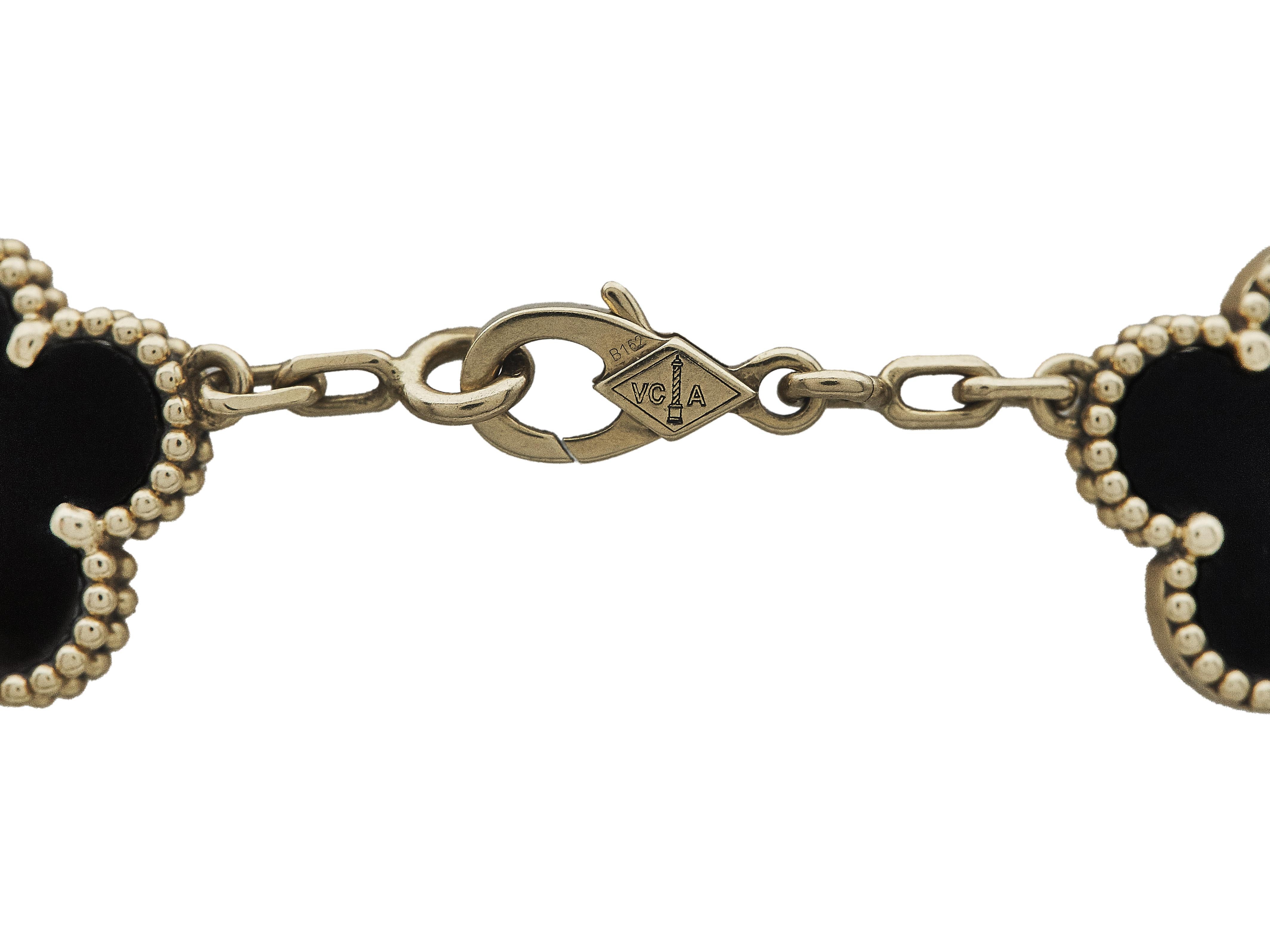 Van Cleef & Arpels	Vintage Alhambra 18K Yellow Gold Onyx 5 Motifs Bracelet In Excellent Condition In New York, NY