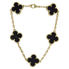 Van Cleef & Arpels	Vintage Alhambra 18K Yellow Gold Onyx 5 Motifs Bracelet