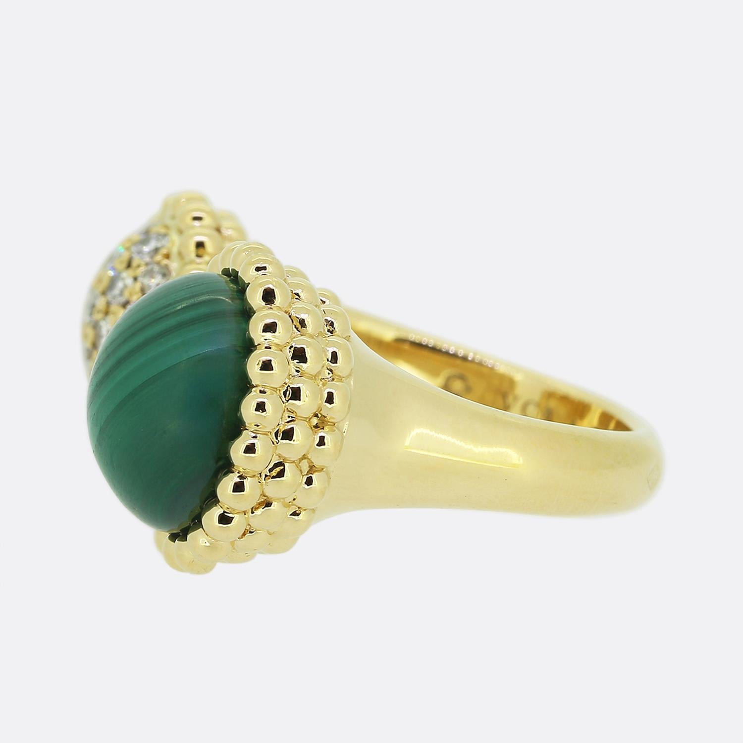 Here we have wonderful creation from the world renowned luxury jewellery designer Van Cleef & Arpels. This ring has been crafted from 18ct yellow gold and showcases and open design consisting of two round motifs, both of which are contained within a
