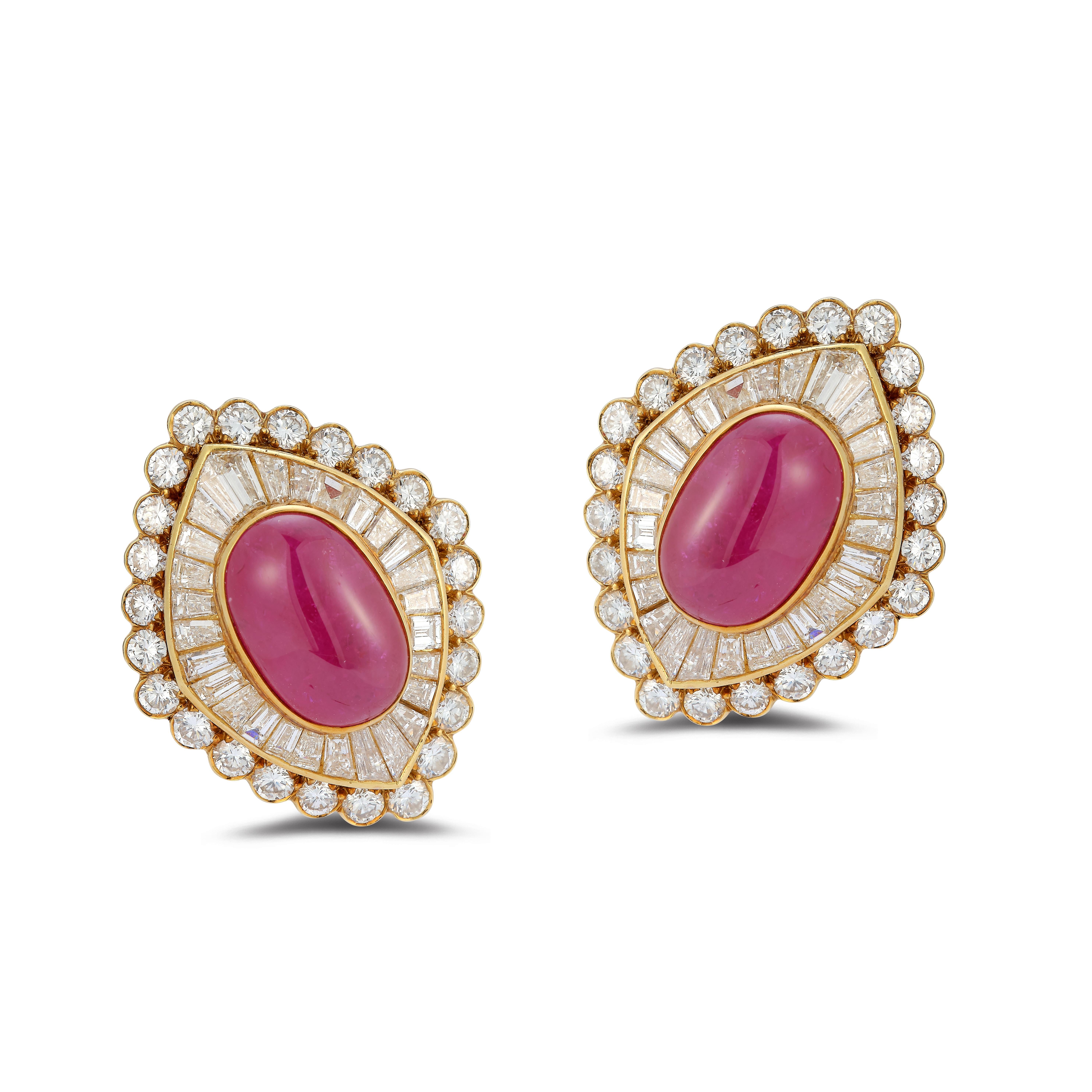 Van Cleef Cabochon Ruby & Diamond Clip On Earrings, A central cabochon ruby, framed by baguette and round diamonds.

Rubies measuring approximately 15.2 x 10.1 x 6.6 and 15.3 x 10.2 x 6.7 mm

Diamonds weighing a total of approximately 8.40