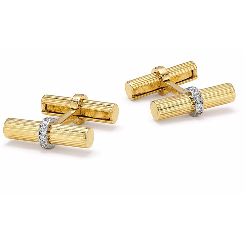 Van Cleef & Arpels New York cufflinks in 14kt yellow gold with round, brilliant cut diamonds. Circa 1960

Mechanical movement to ease the fit 