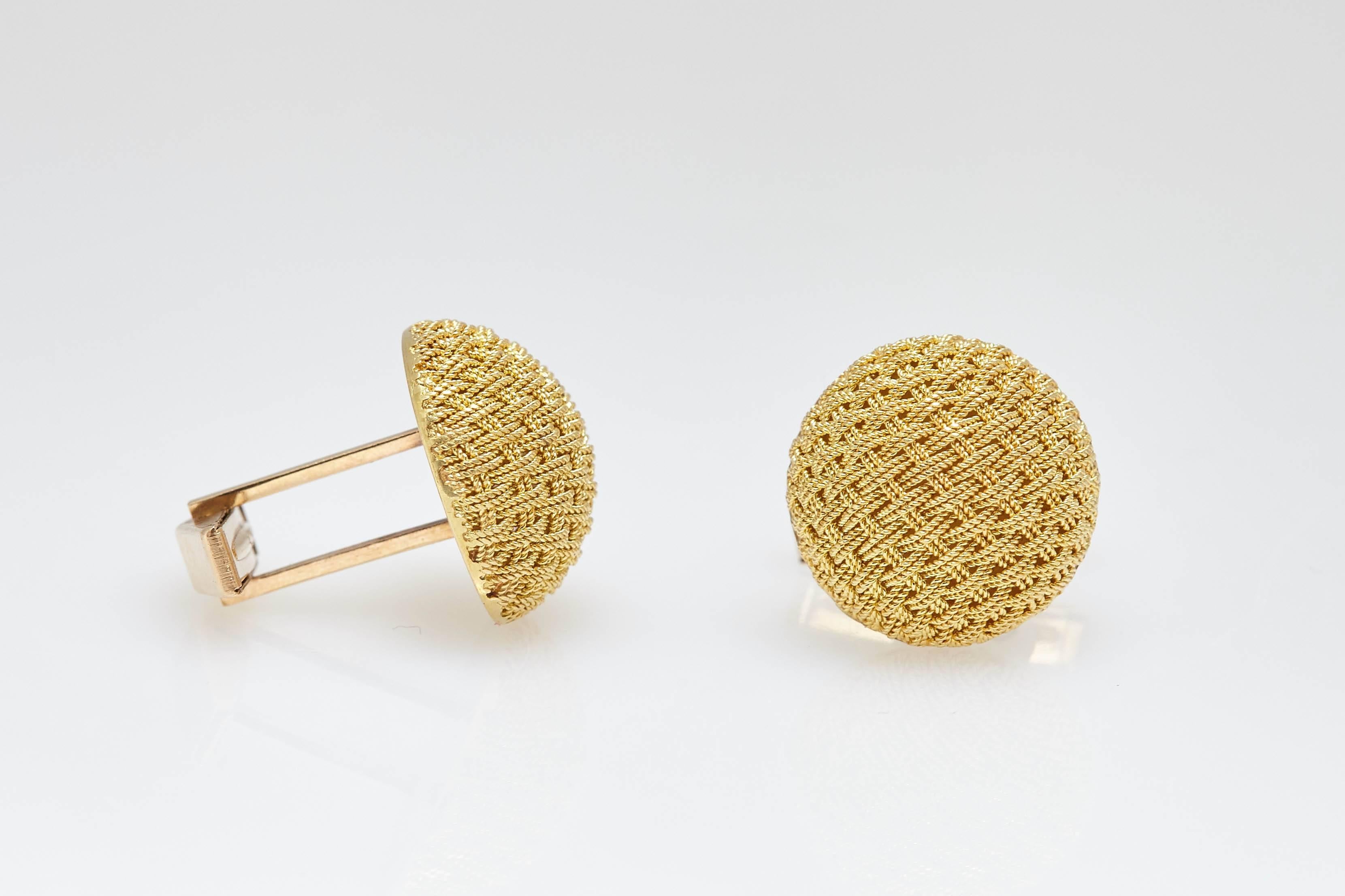 A pair of Van Cleef New York textured 14kt gold cufflinks. Made in the U.S, circa 1960s.