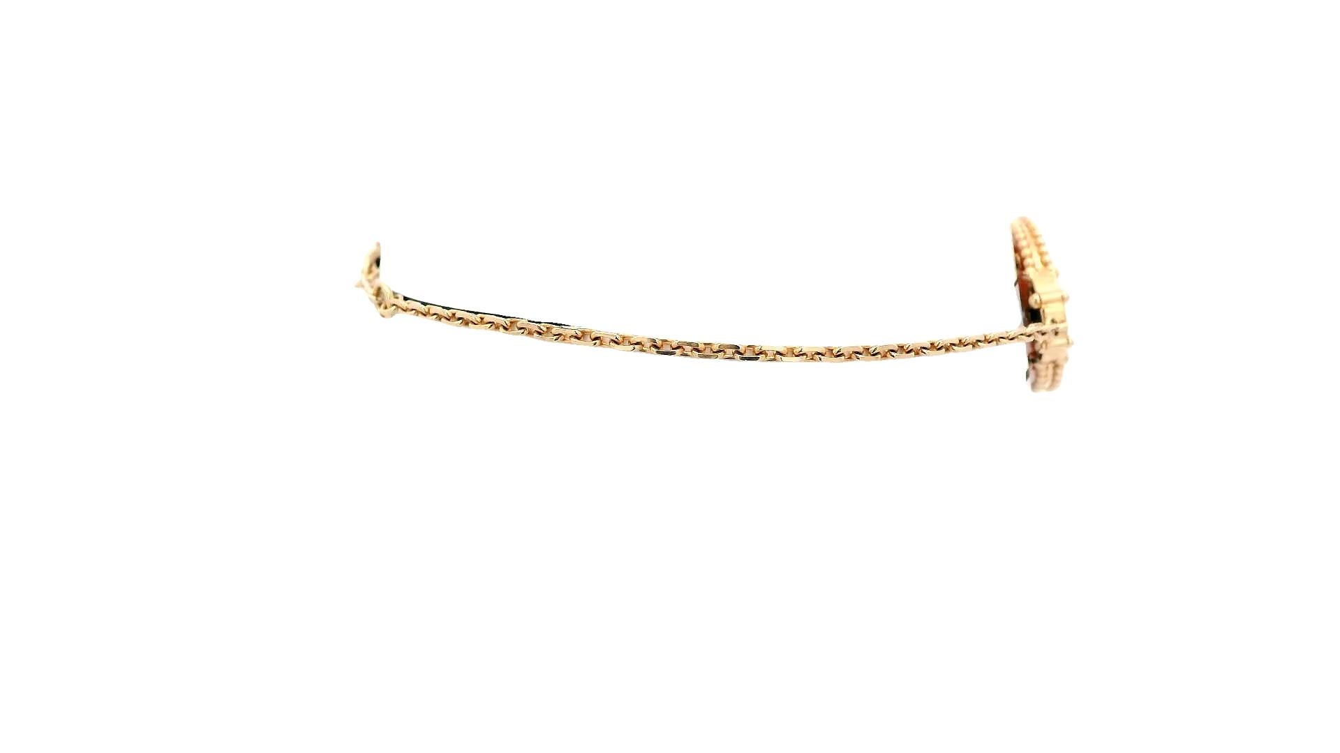 Van Cleef Lucky Spring, or rose 18 carats, onyx, cornaline, boîte et papiers Excellent état - En vente à Great Neck Plaza, NY