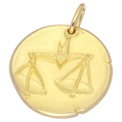 Van Cleef & Arpels Pendentif porte-monnaie Libra en or jaune 18 carats avec signe du zodiaque vintage