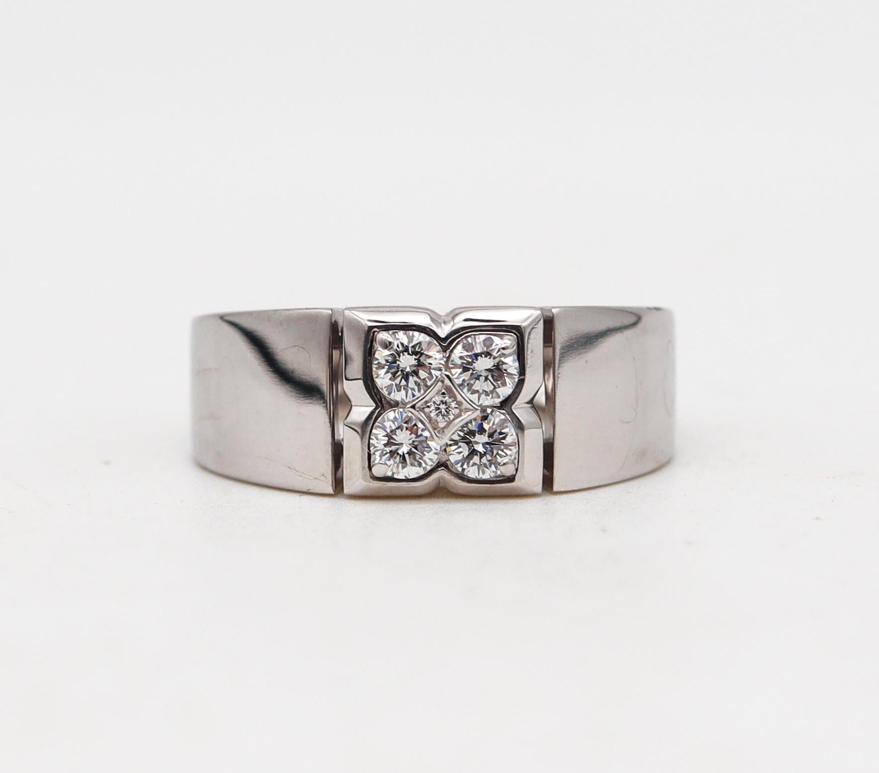 Quatrefoil Ring designed by Van Cleef & Arpels.

An elegant contemporary ring, created at the maison of Van Cleefs & Arpels in Paris France.  Crafted with a bold solid look in white gold of 18 karats with high polished finish. This quatrefoil ring