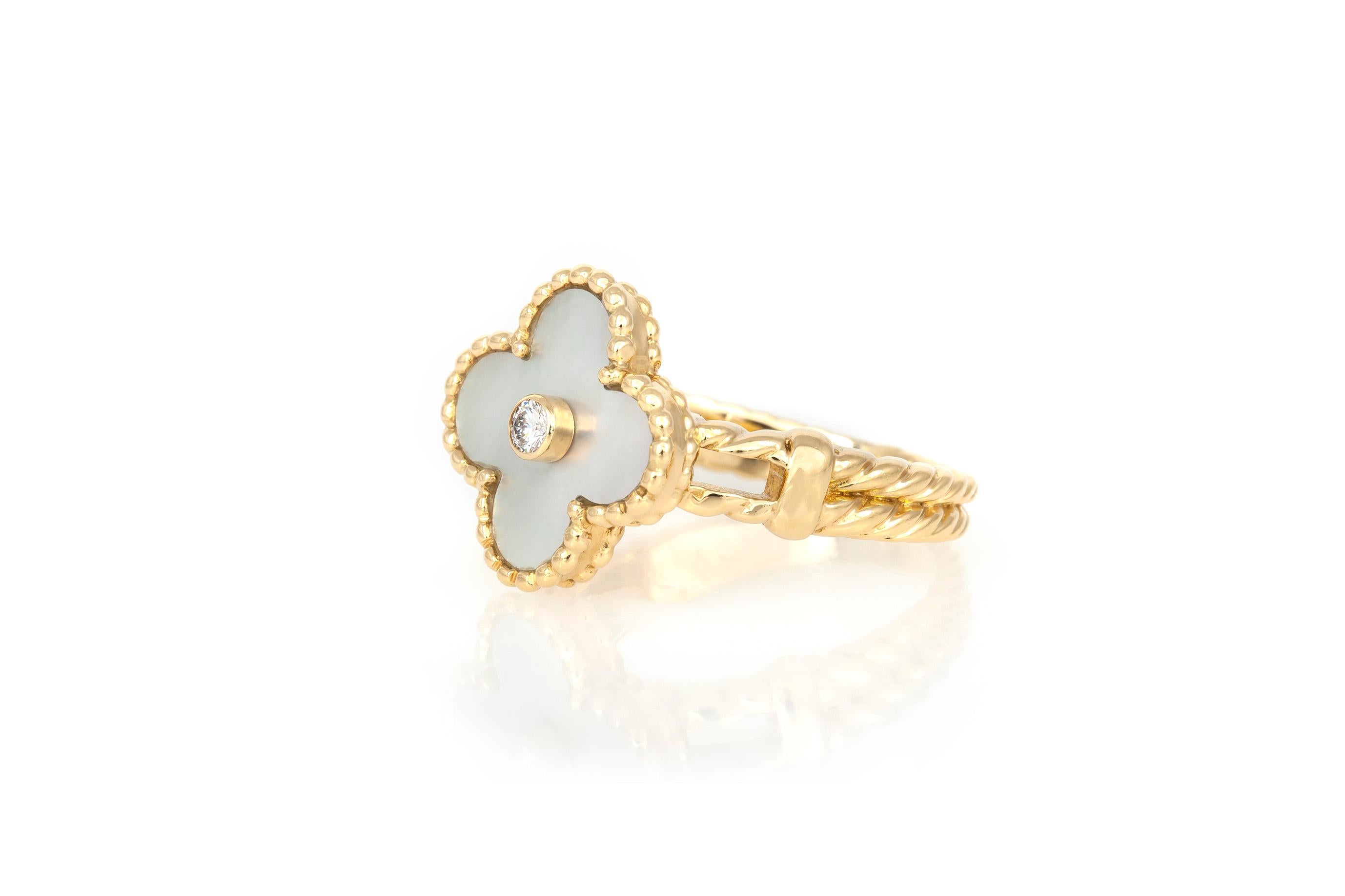 Beautiful Van Cleef and Arpels mother of pearl ring finely crafted in 18k gold.
