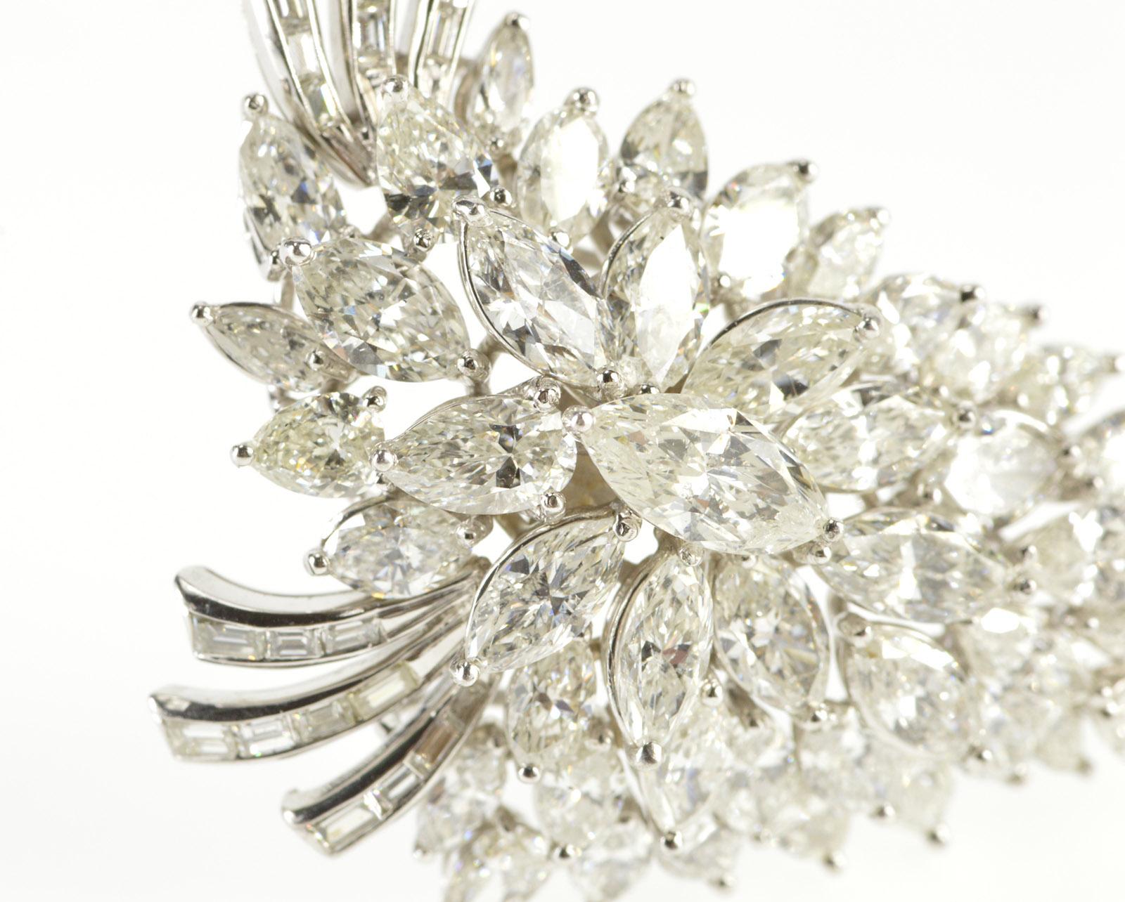 A Grand Marquise of diamonds, this tantalizing piece by Elwood Van Clief doubles as both a pendant and a brooch. Featuring an exquisite combination of marquise diamonds, the piece contains 25x .20 carat marquise diamonds totaling 5 carats, 15x .25