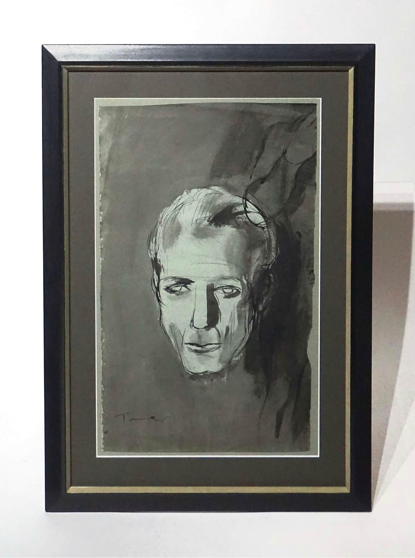 A unique and original circa 1945 self-portrait by the legendary designer Van Day Truex painted in black ink, ink wash, and watercolor on celadon green watercolor paper and housed in its original black painted frame with green painted fillet, newly