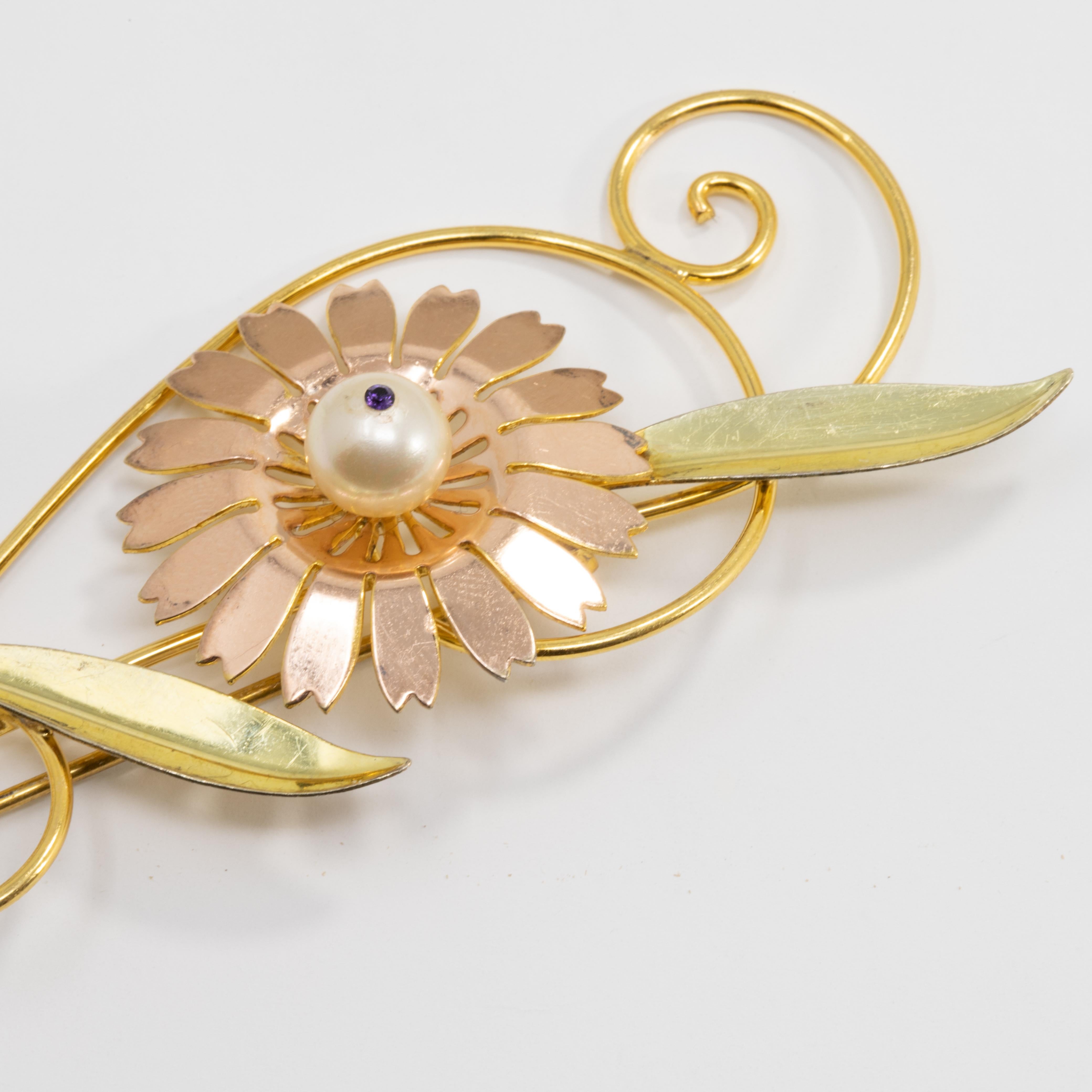An elegant flower pin from Van Dell. Features a single flower with winding wire stems and leaves, accented with a single faux pearl. A bright and bold, yet sophisticated, brooch! 12K gold filled sterling silver.

Hallmarks: Van Dell, 1/20-12K-G.F.,