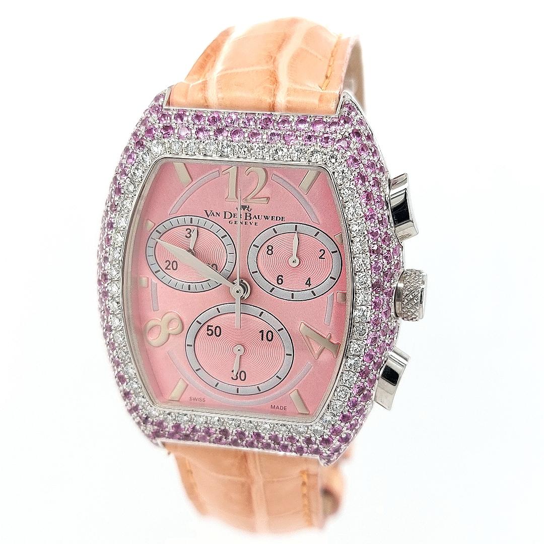 Van Der Bauwede Magnum XS Chronograph, Pink Dial with Diamonds & pink sapphires.

Beautiful and elegant full diamond and pink sapphire set stunning VDB watch.

Movement: quartz, caliber 65

Functions: hours, minutes, subsidiary seconds, chrono