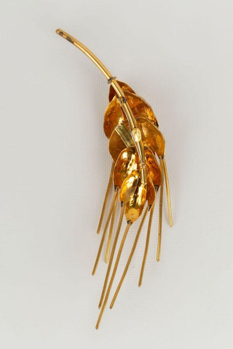 Van Der Straeten - Broche en métal doré symbolisant un épi de blé.

Informations complémentaires :
Dimensions : 19 cm x 4 cm
Condit : Très bon état.
Numéro de référence du vendeur : BR110