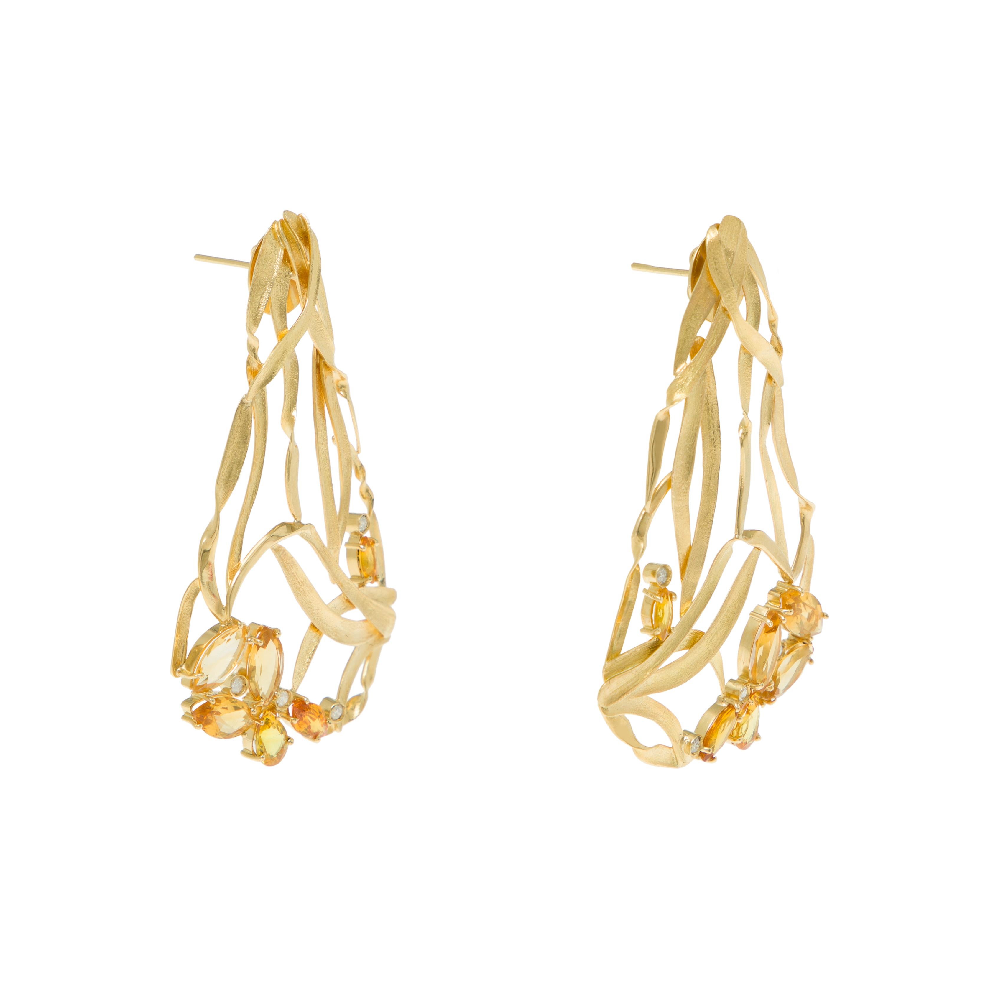 Earrings
Gold 18K
Yellow Sapphires, Citrines and Diamonds
Handmade, bright polished finished, matte finish and prong setting

A' Design Award (2020-2021) special mention

The soft hues of the yellow gemstones mimic Van Gogh’s flowers.  Diamonds give