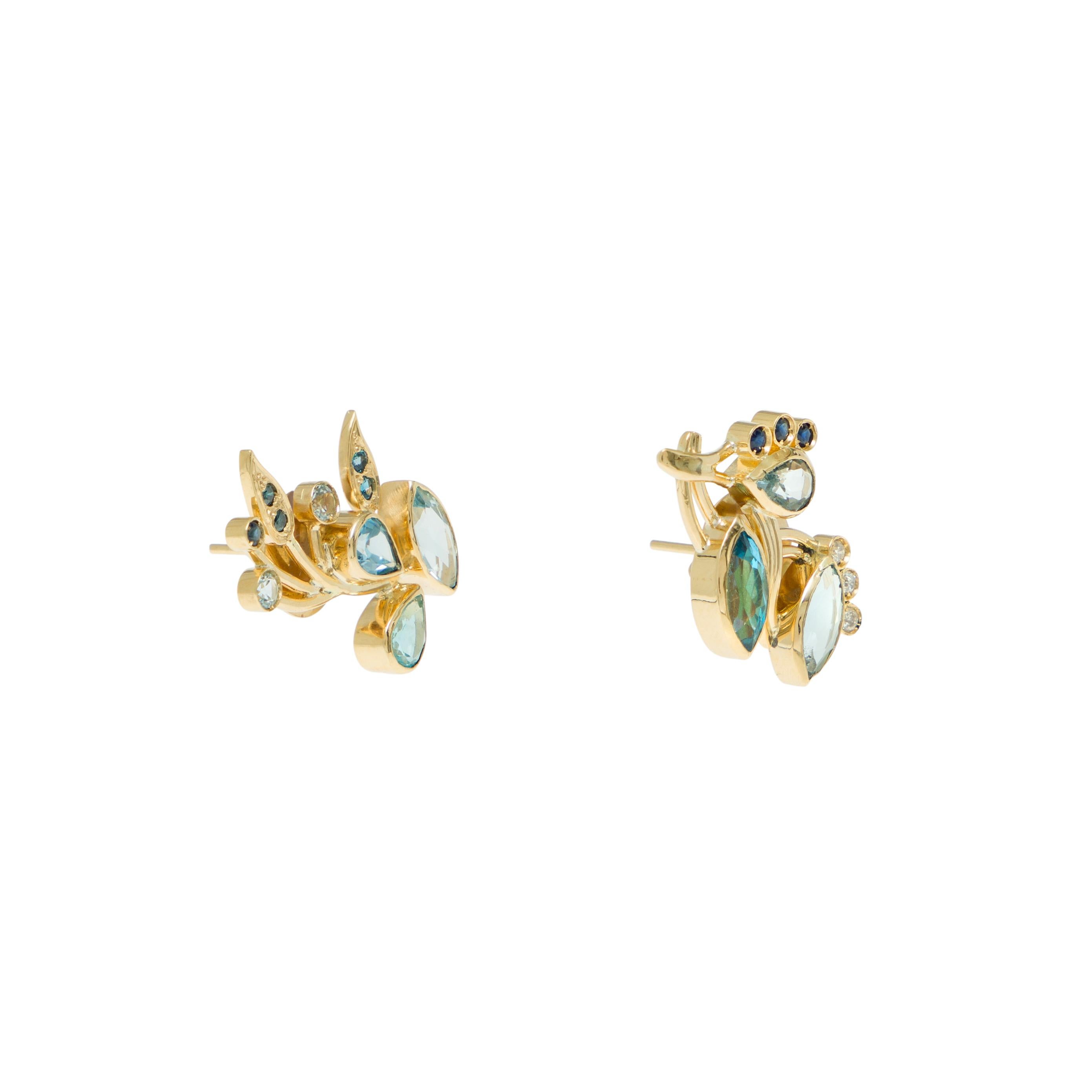 Earrings
Gold 18K
White and Blue Diamonds, Blue Sapphires, Apatites, Blue Topazes (London, Swiss and Sky)
Handmade, polished finish and bezel setting

When first painted, the shades of purple and pink were very dominant in Van Gogh’s “Vase with