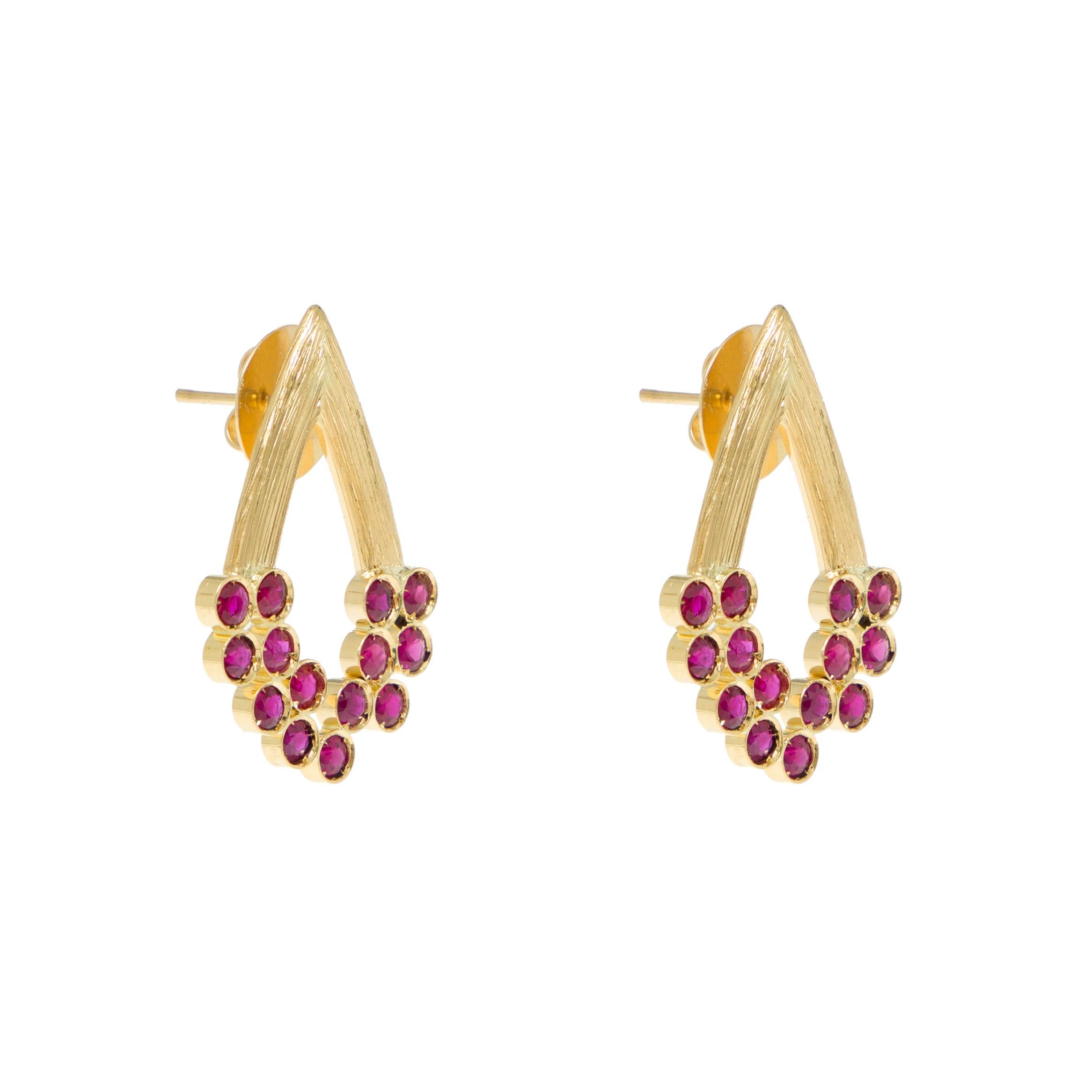 Earrings
Gold 18K 
Ruby
Handmade, polished finish and bezel setting

They say the composition of Van Gogh’s painting “Poppy Field” is highly reminiscent of those in Monet’s painting of the same subject.  The round and faceted rubies resemble the red