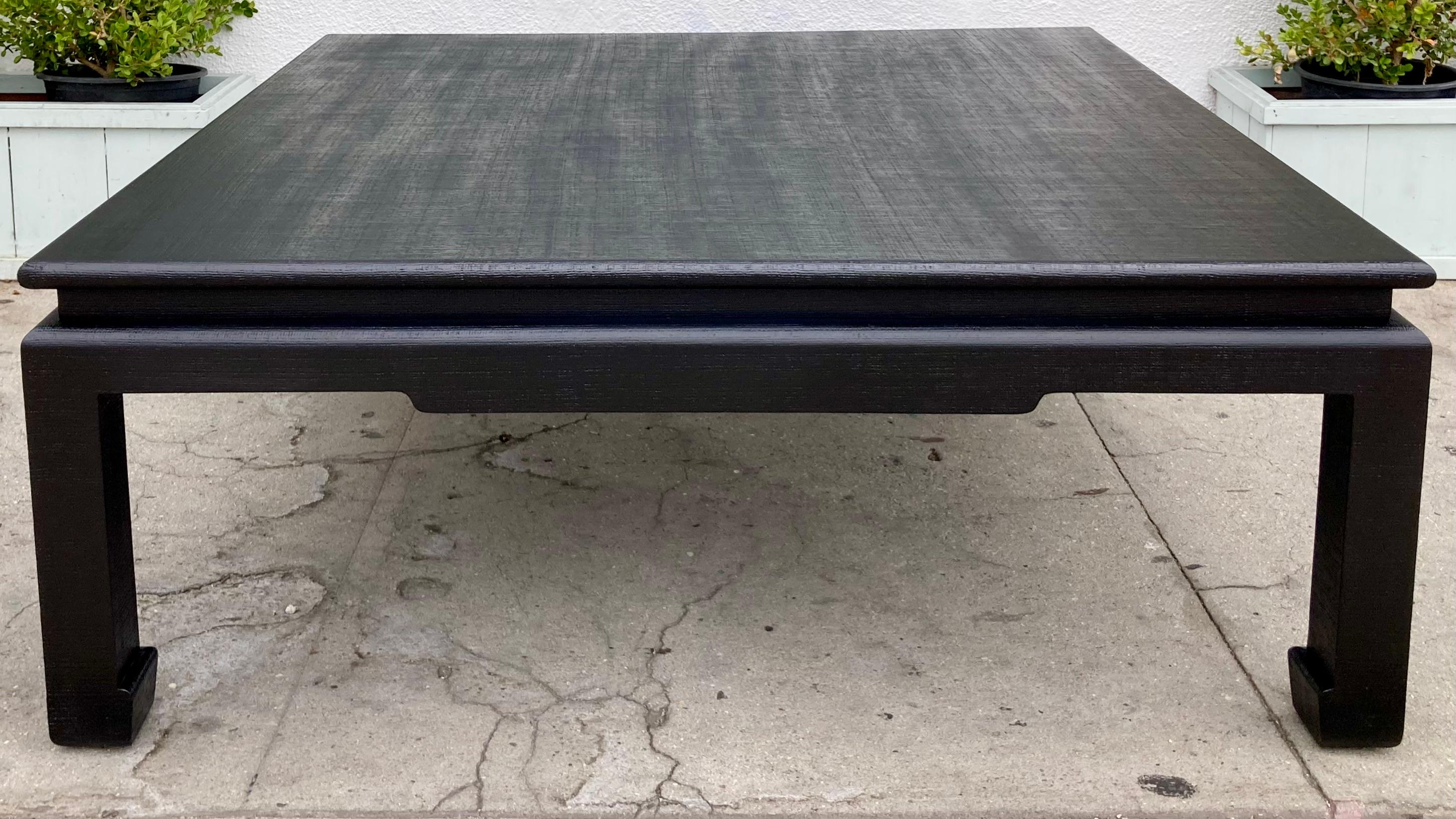 Gorgeous Van Horn linen wrapped coffee table with satin black lacquered finish. Great texture and large scale table to display your favorite collections. Great modern style.