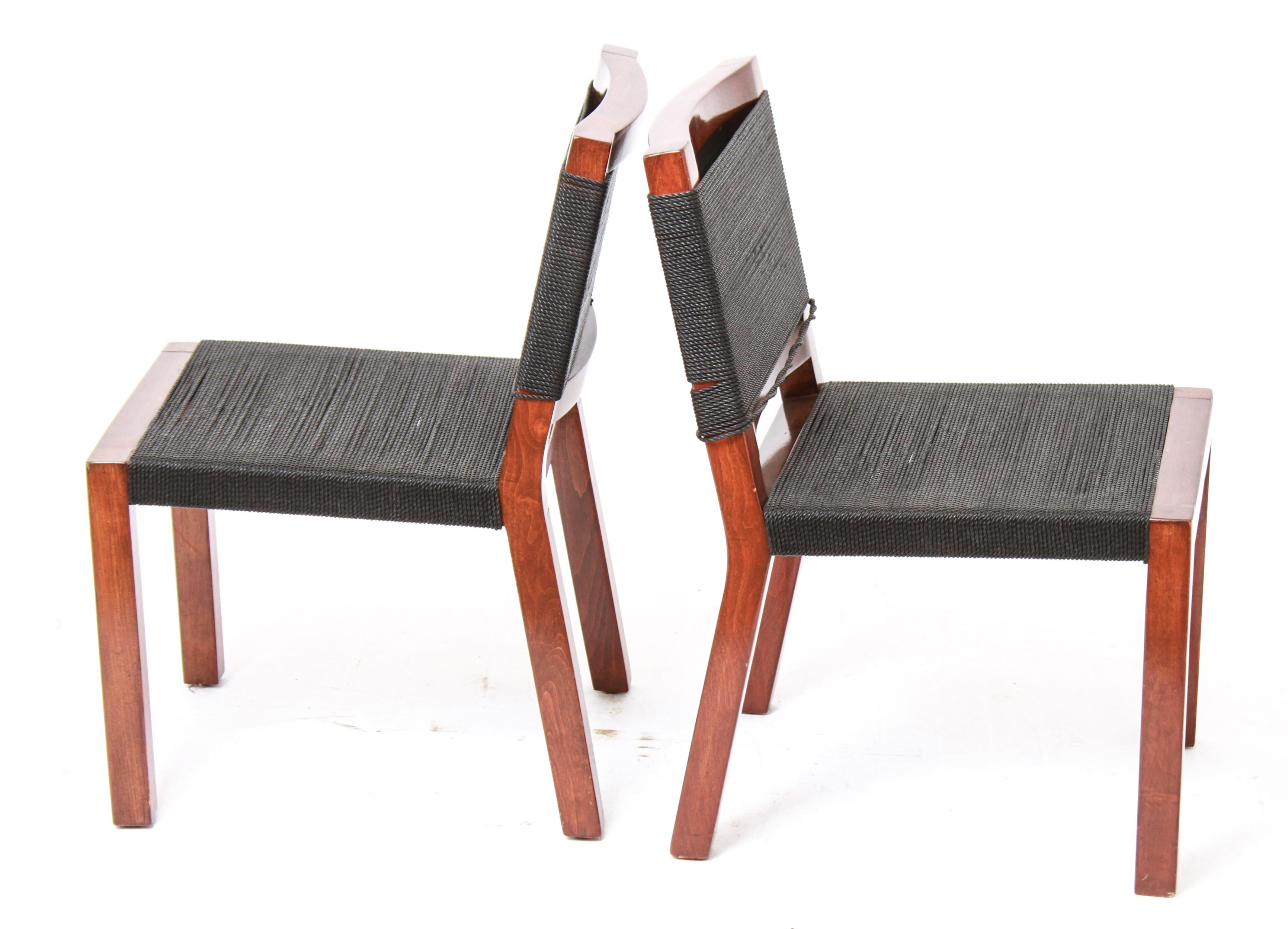 Modern pair of Hendrik van Keppel & Taylor Greene for Van Keppel-Greene side chairs with wood frames and black vinyl cord seats and backs. The pair is in great vintage condition with age-appropriate wear. From the Collection of Actor Ron Rifkin.