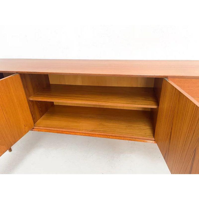 Van Pelt Belgian Sideboard with Drawers, 1970

This elegant sideboard with drawers is a perfect example of pure vintage elegant furniture. This sideboard is made in the 1970 by the respected Belgian manufacturer Van Pelt. It features four drawers