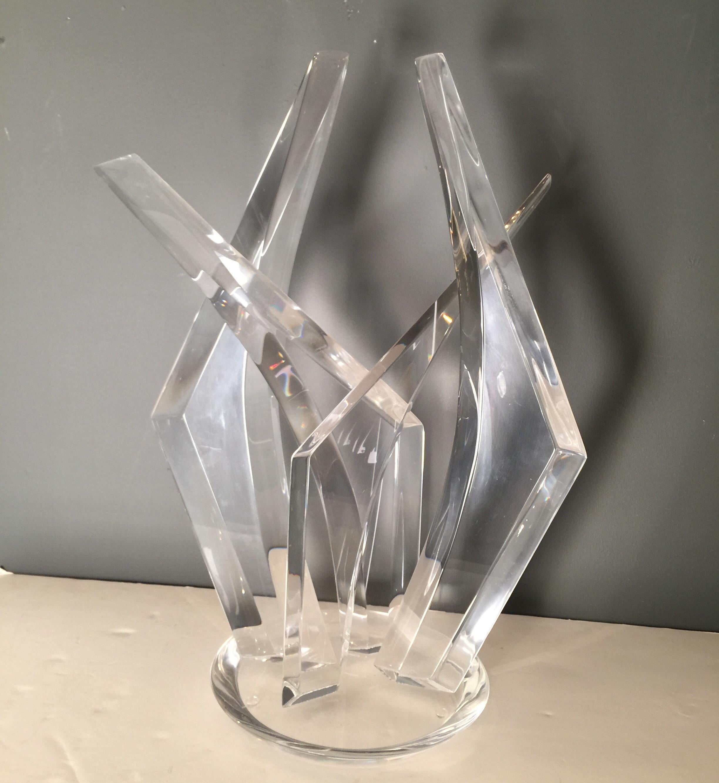 This is a masterful sculpture by Hivo Van Teal. Its dramatic side commands attention, yet it seems to unify everything around it. A stunning piece for the modernist collector.