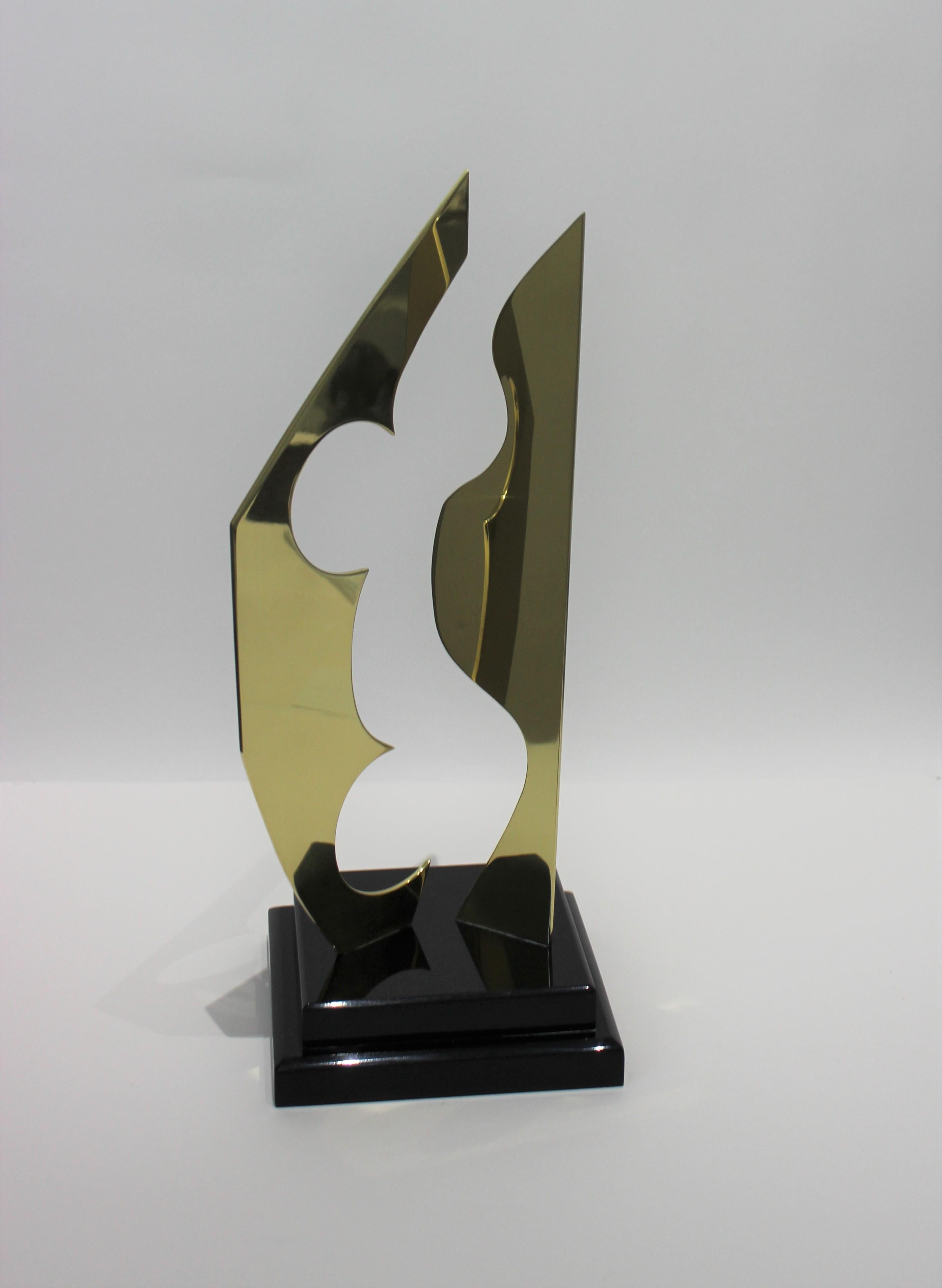 Hivo Van teal signed abstract sculpture in polished brass and black Lucite from a Palm Beach estate

has been professionally cleaned and polished.