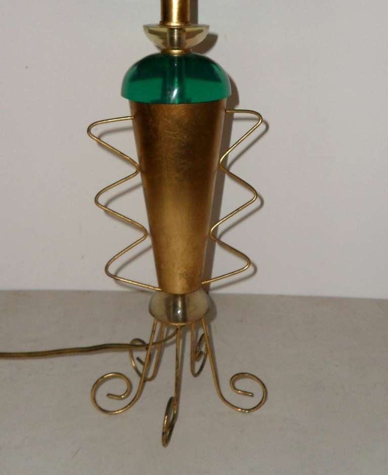 Mid-Century Modern green Lucite and gilded metal with the original shade Van Teal table lamp.
Base measures 7 inches diameter.
US wired and in working condition.
    
