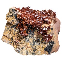 Ammasso di cristalli di vanadinite con matrice di barite da Mibladen, Marocco