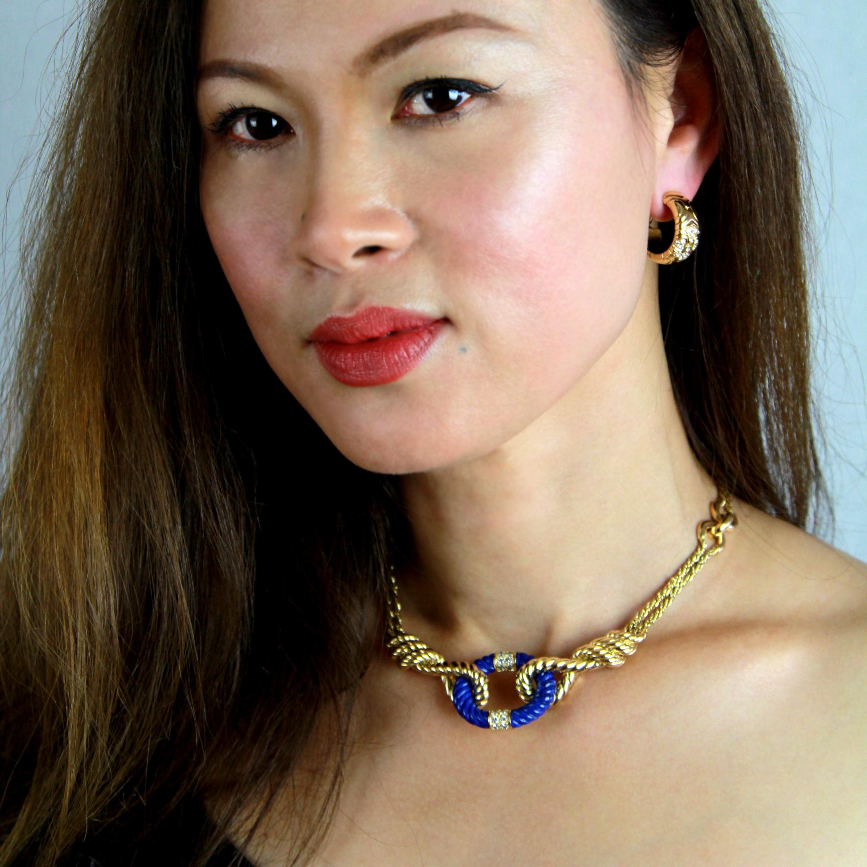 Retro 1970 VanCleef and Arpels necklace in 18 karat twists of yellow gold loop elegantly around an oval hoop of bright blue Lapis lazuli in this stunning nautical-inspired necklace. The Lapis hoop, also designed to resemble rope, is decorated with
