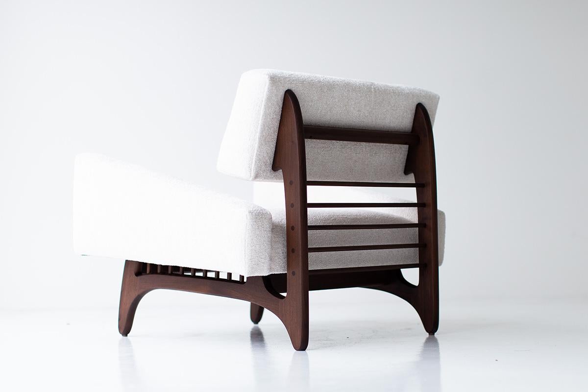 This Craft Associates modern side chair is beautifully constructed from solid wood in Ohio, USA. The lounge chair's silhouette is simple, modern, and sleek with comfortable back and seat cushions. This is the perfect chair for any space, indoor or